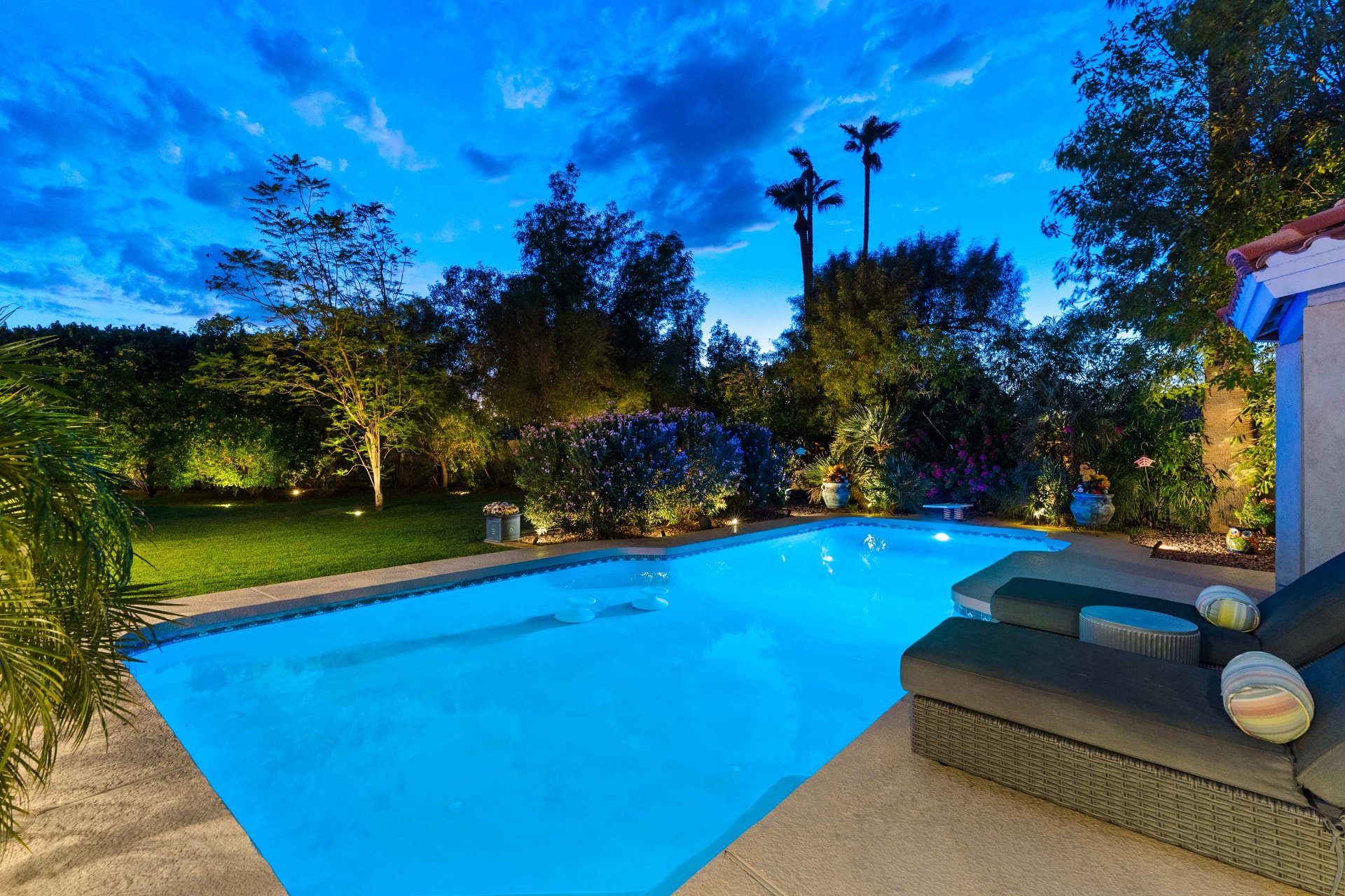 The pool and grounds at twilight