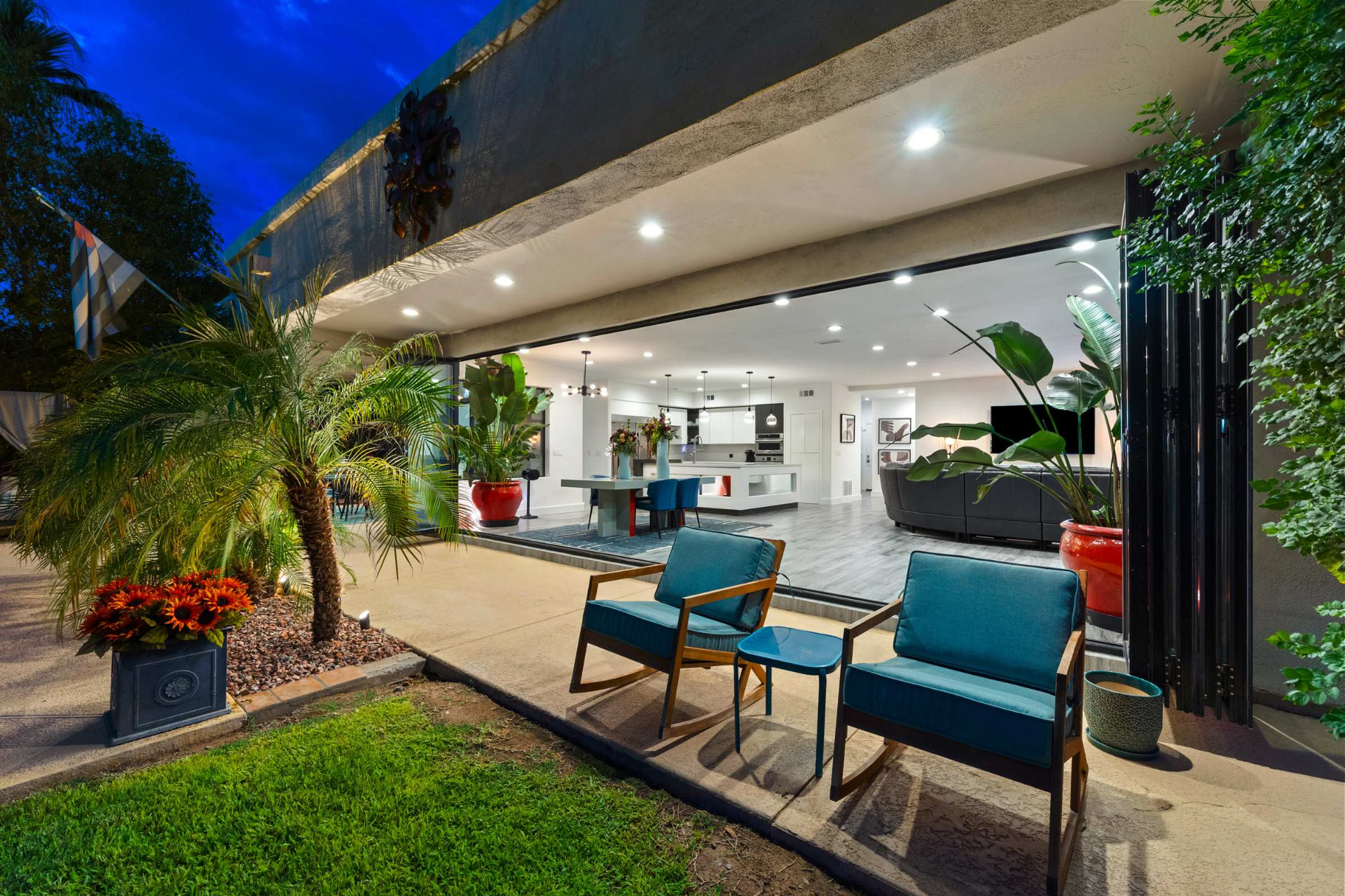 The patio at twilight with the doors stacked away